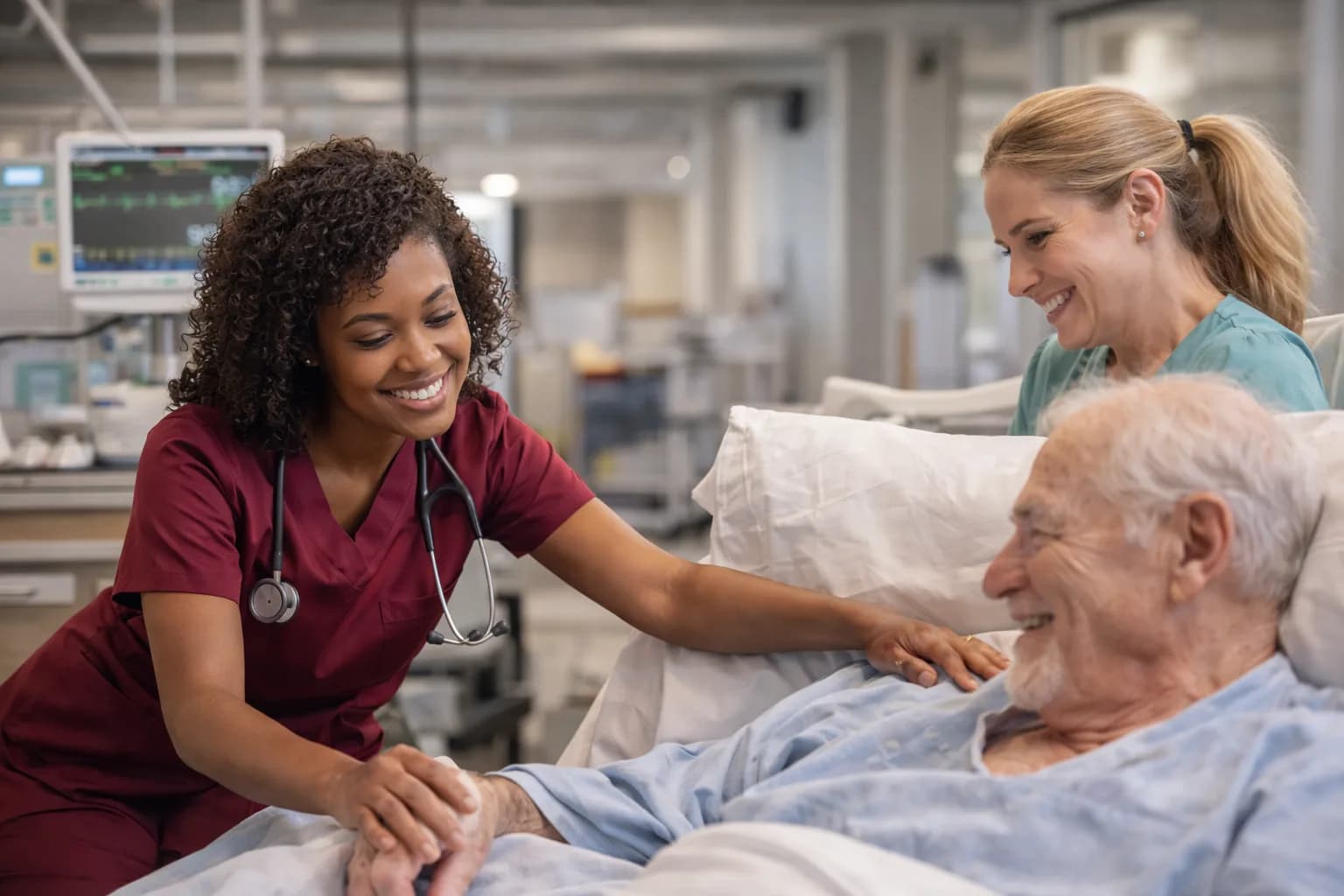 Clinicians caring for a patient in a modern hospital setting